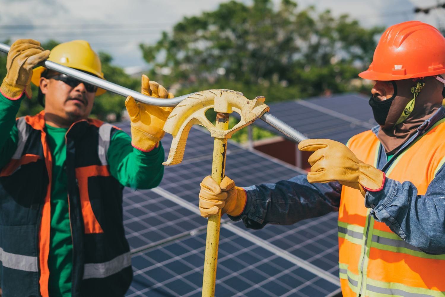 Solar technicians coordinating installation work on site